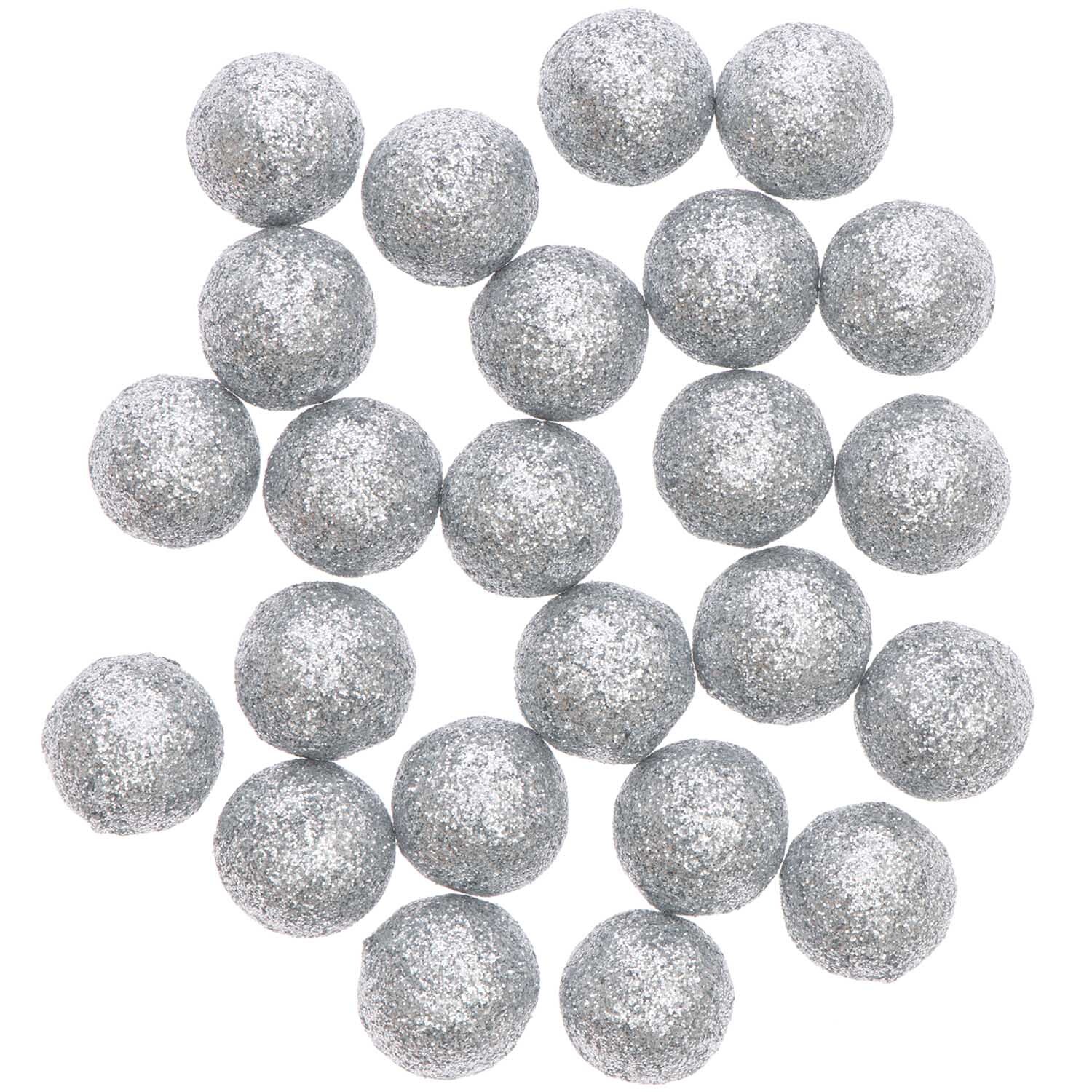 Glitterkugeln silber von Rico Design: Eine Ansammlung von glänzenden, silbernen Kugeln auf schwarzem Hintergrund.