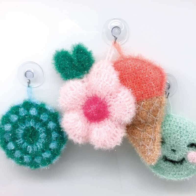 Creative Bubble: Bunte, gehäkelte Schwämme in Form von Blume, Eis und Kreis, ideal für kreative Reinigung.