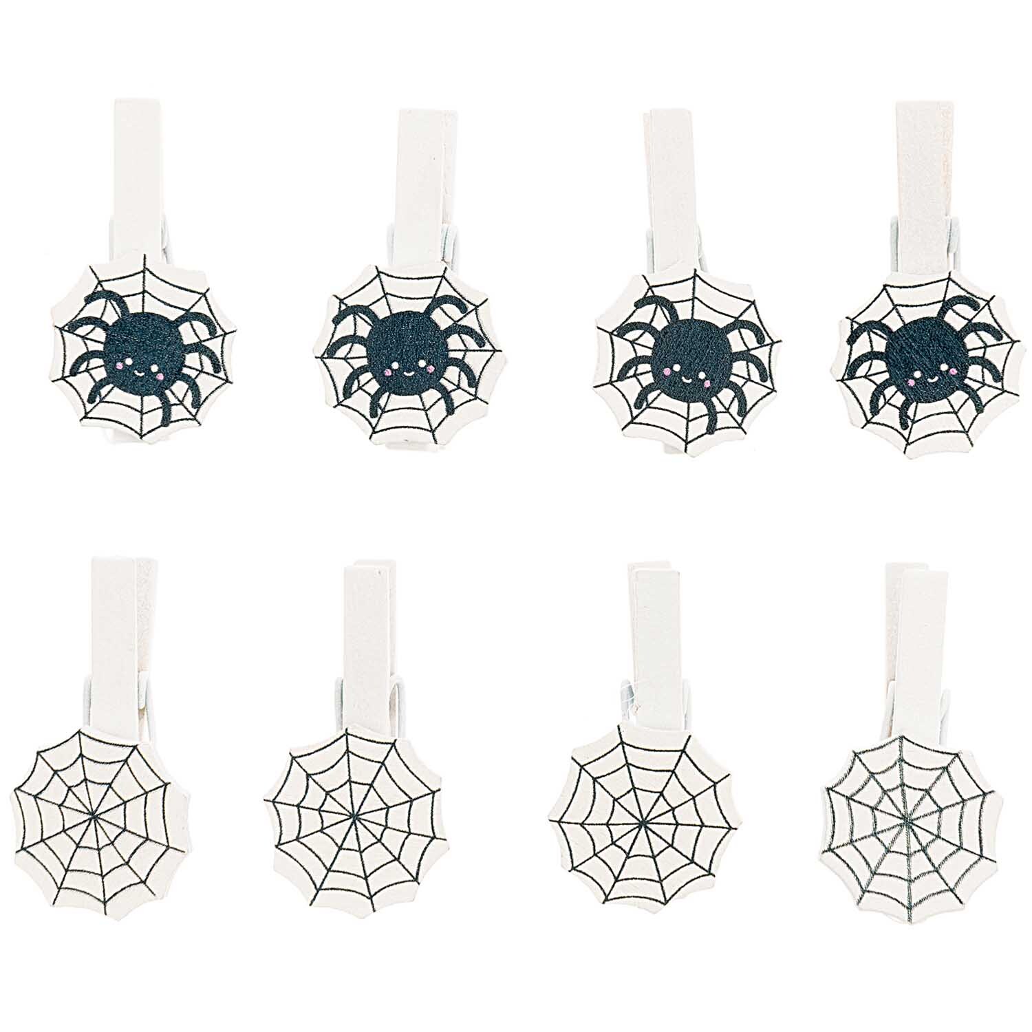 Holzclips Spinnennetz Mix von Rico Design, 8 Stück. Schwarze und weiße Spinnennetzmuster auf Clips. Ideal für kreative Dekorationen.