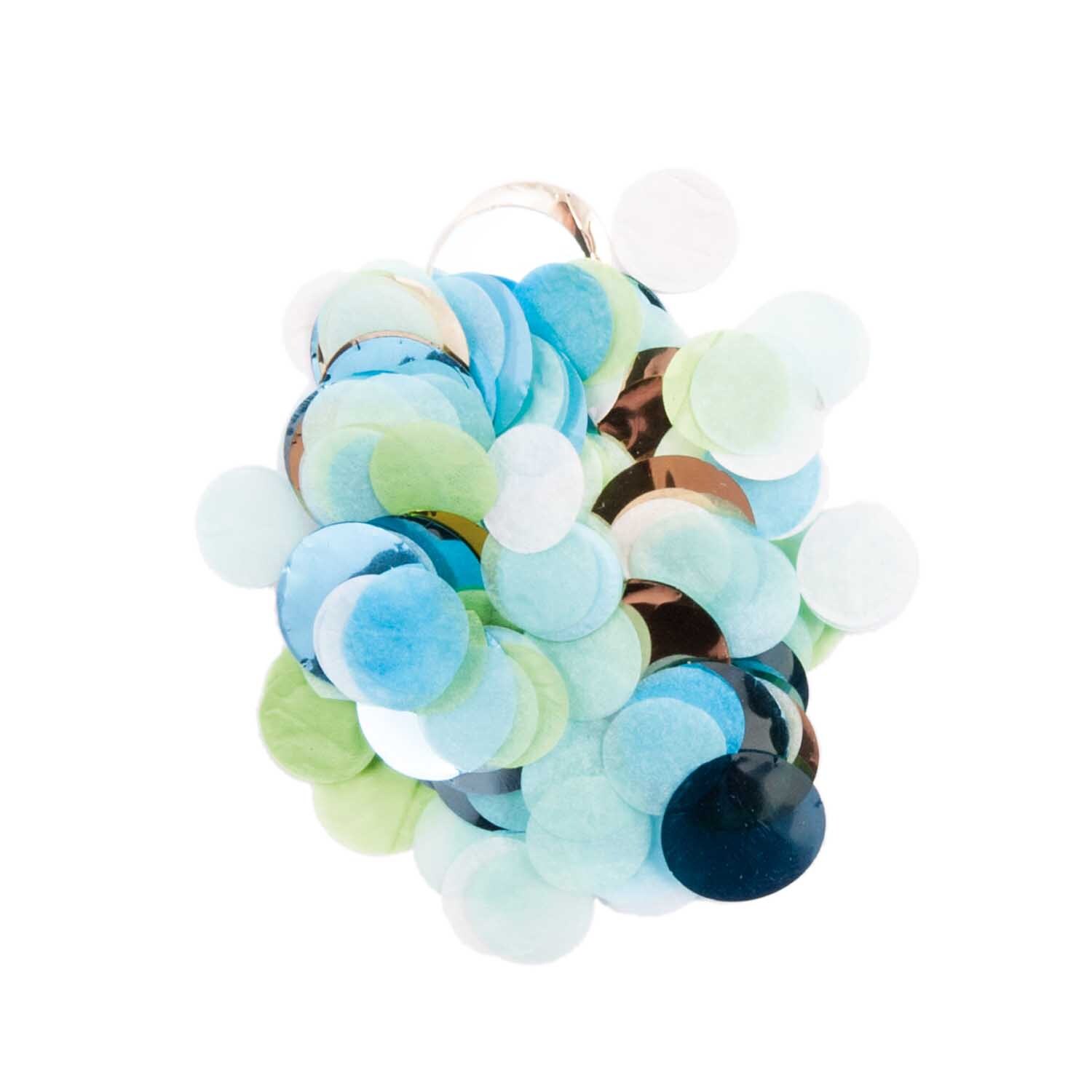 Konfetti blau-grün Mix 20g von Rico Design zeigt bunte, runde Partikel in Blau- und Grüntönen. Ideal für festliche Dekorationen.