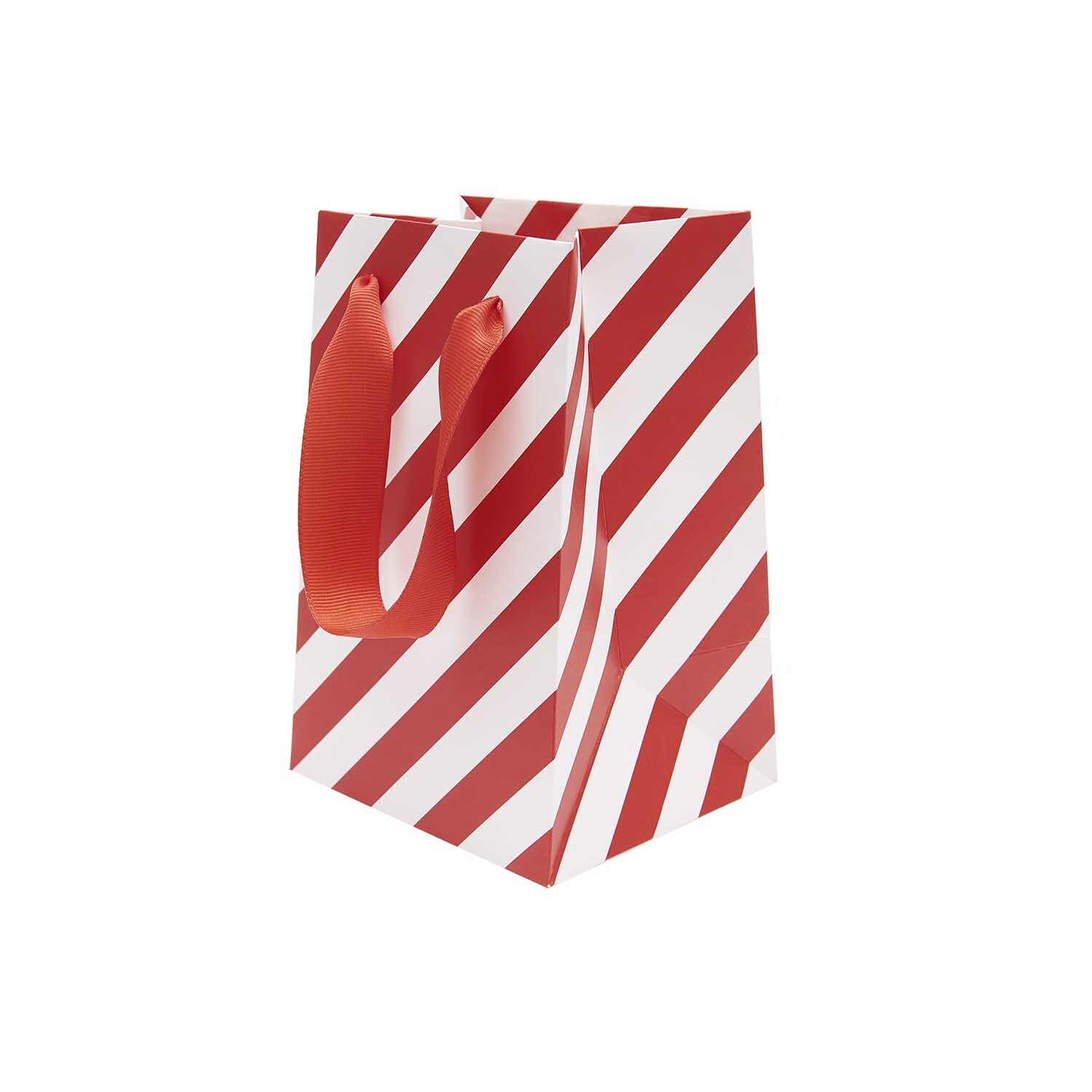 Paper Poetry Geschenktüte mit Streifenmuster und roten Henkeln, ideal für Geschenke.