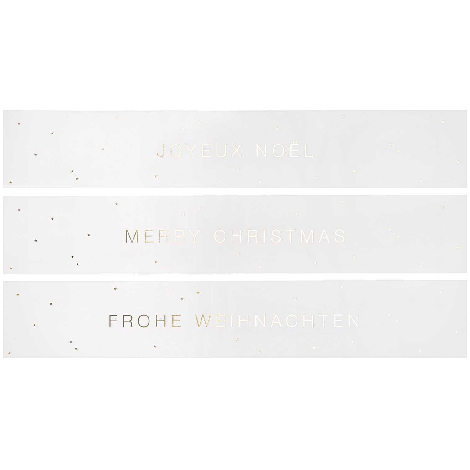 Paper Poetry Papierstreifen mit weihnachtlichen Grüßen in drei Sprachen auf weißem Hintergrund. Ideal für festliche Dekorationen.