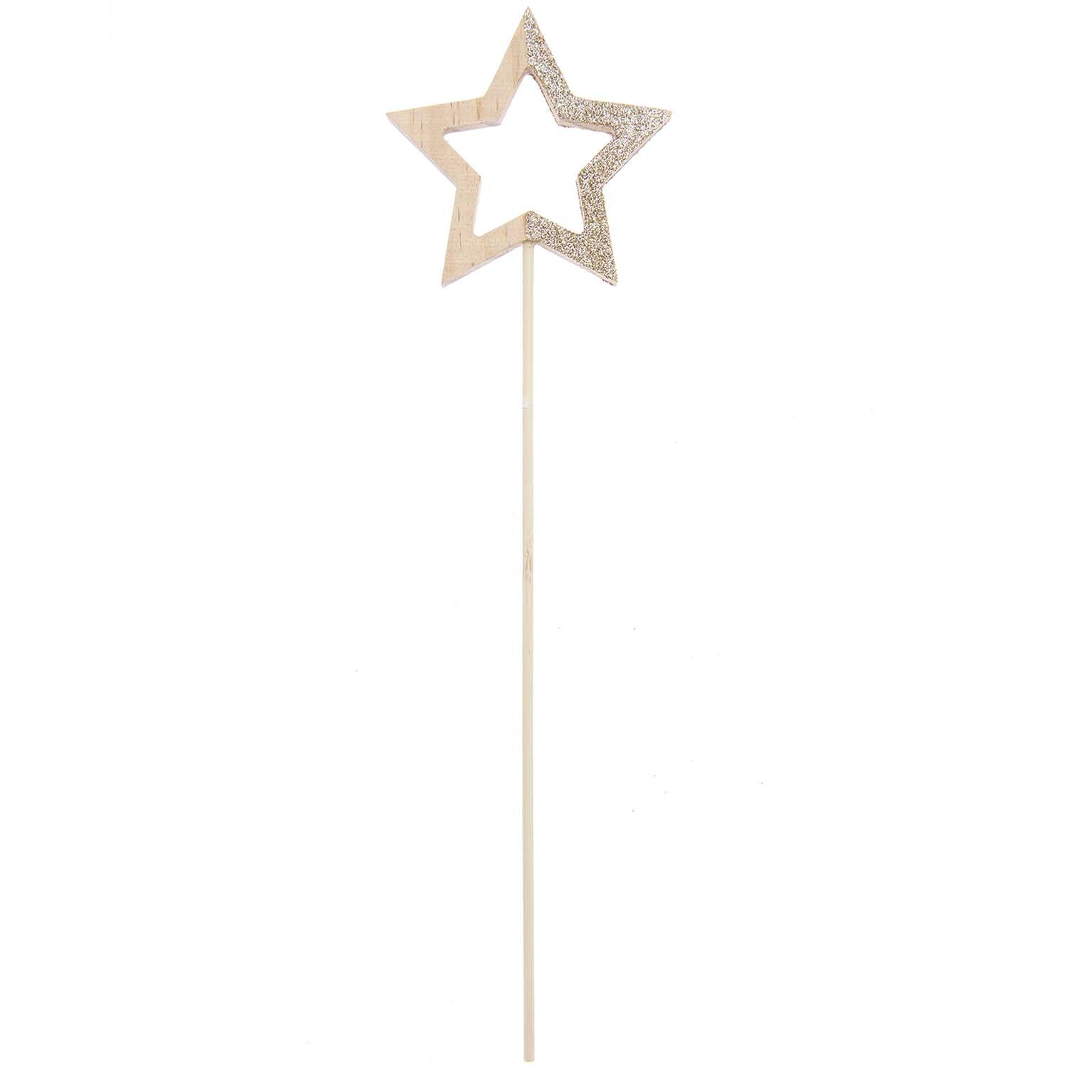 Holzpicker Stern 28,5x8x1cm von Rico Design in Natur-Gold. Sternförmiger Holzpicker mit glitzerndem Rand. Ideal für Dekorationen.