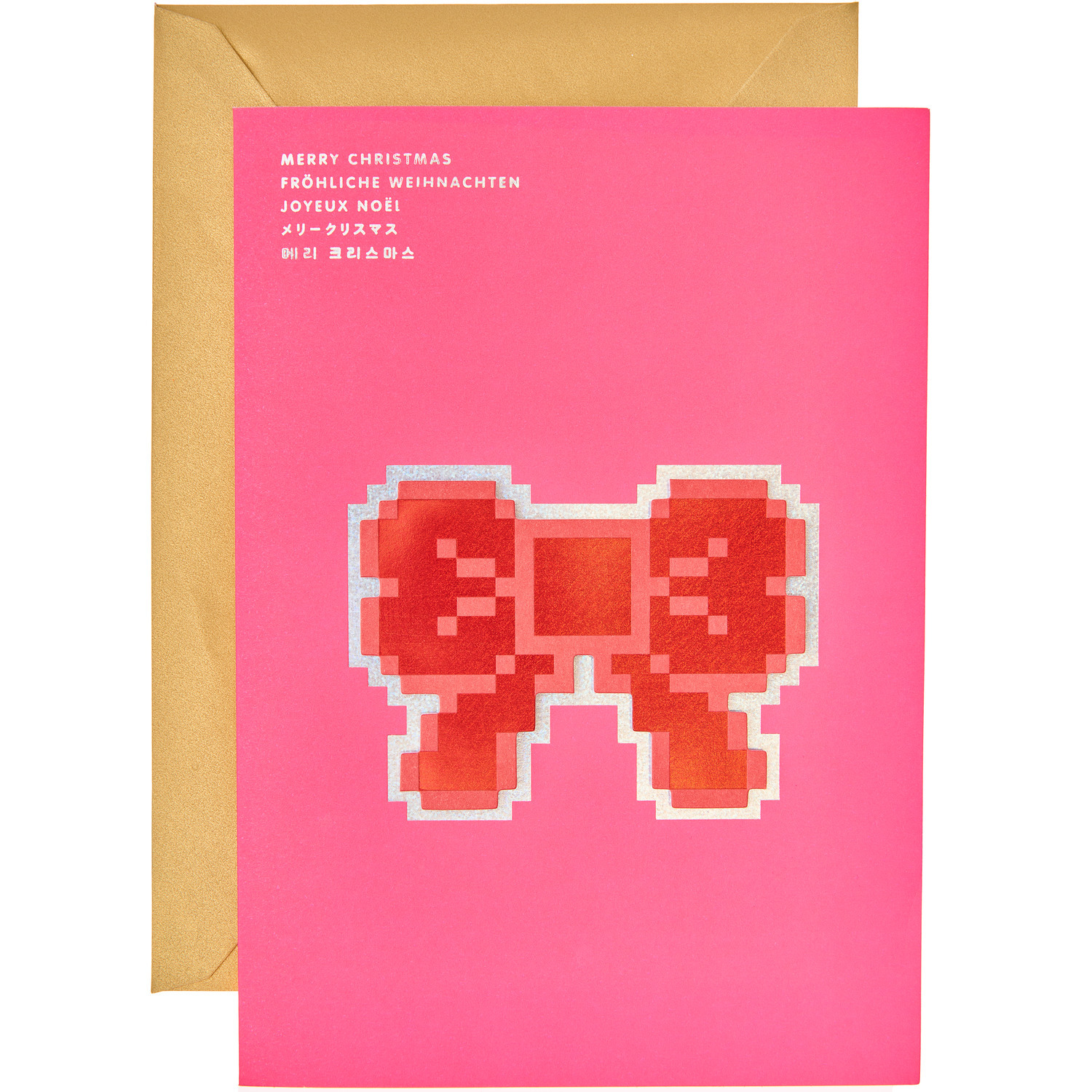 Paper Poetry 3D-Kartenset Schleifen Pixel zeigt eine pixelige rote Schleife auf rosa Hintergrund.