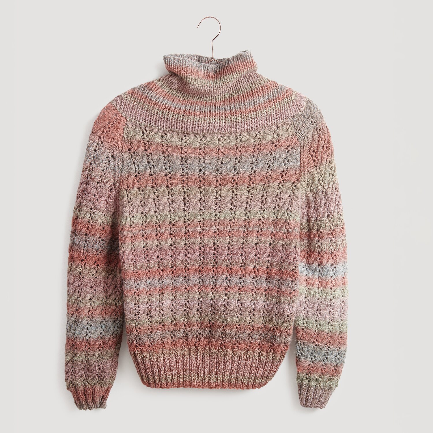 Creative Melange Alpaca Wonderball dk 100g 300m Farbe Spring von Rico Design Strickset Pullover Modell 15: Warmer Pullover in sanften Pastelltönen, gestrickt aus Creative Melange Alpaca Wonderball dk.