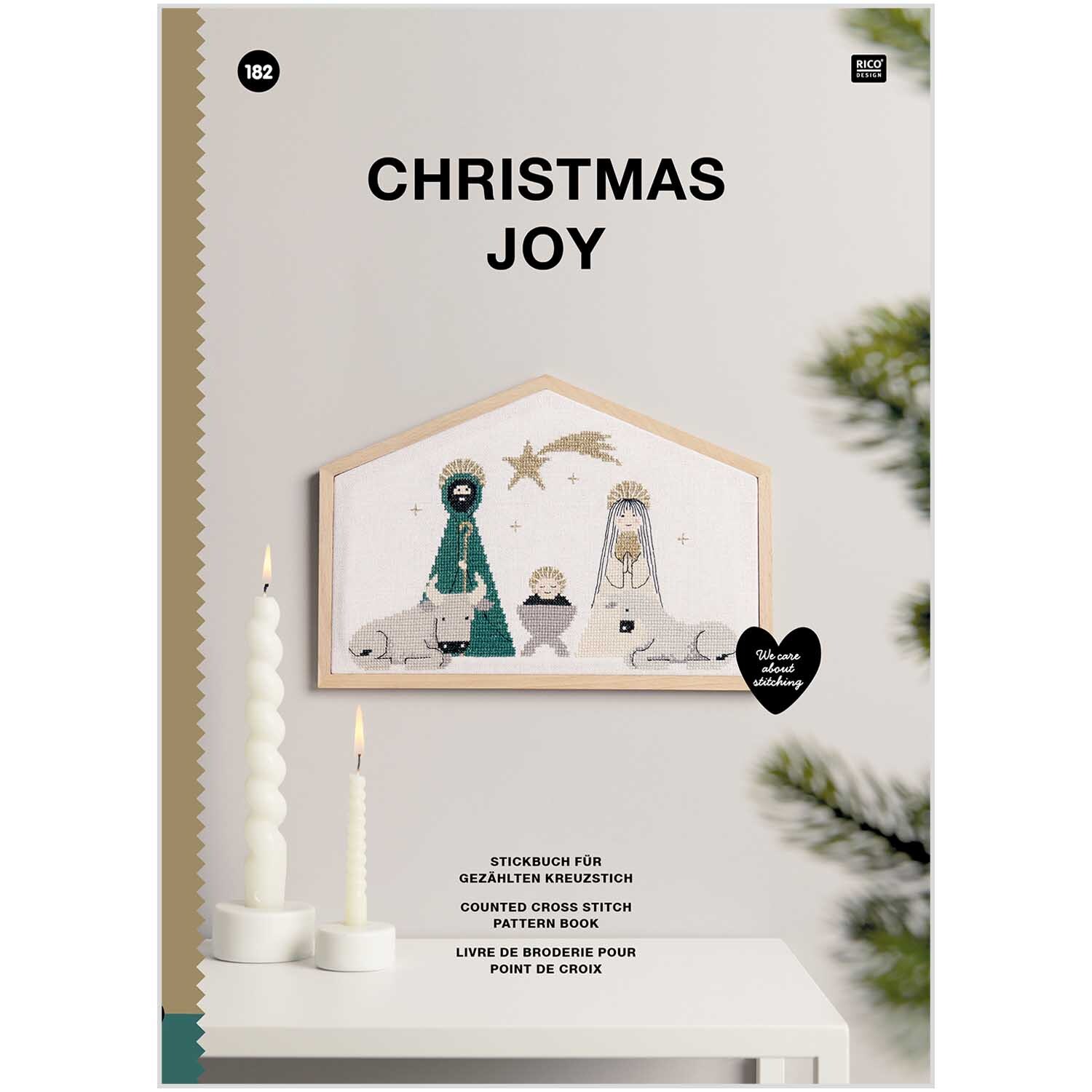 Stickbuch Christmas Joy Nr. 182 zeigt ein weihnachtliches Kreuzstichmuster mit Krippenszene.