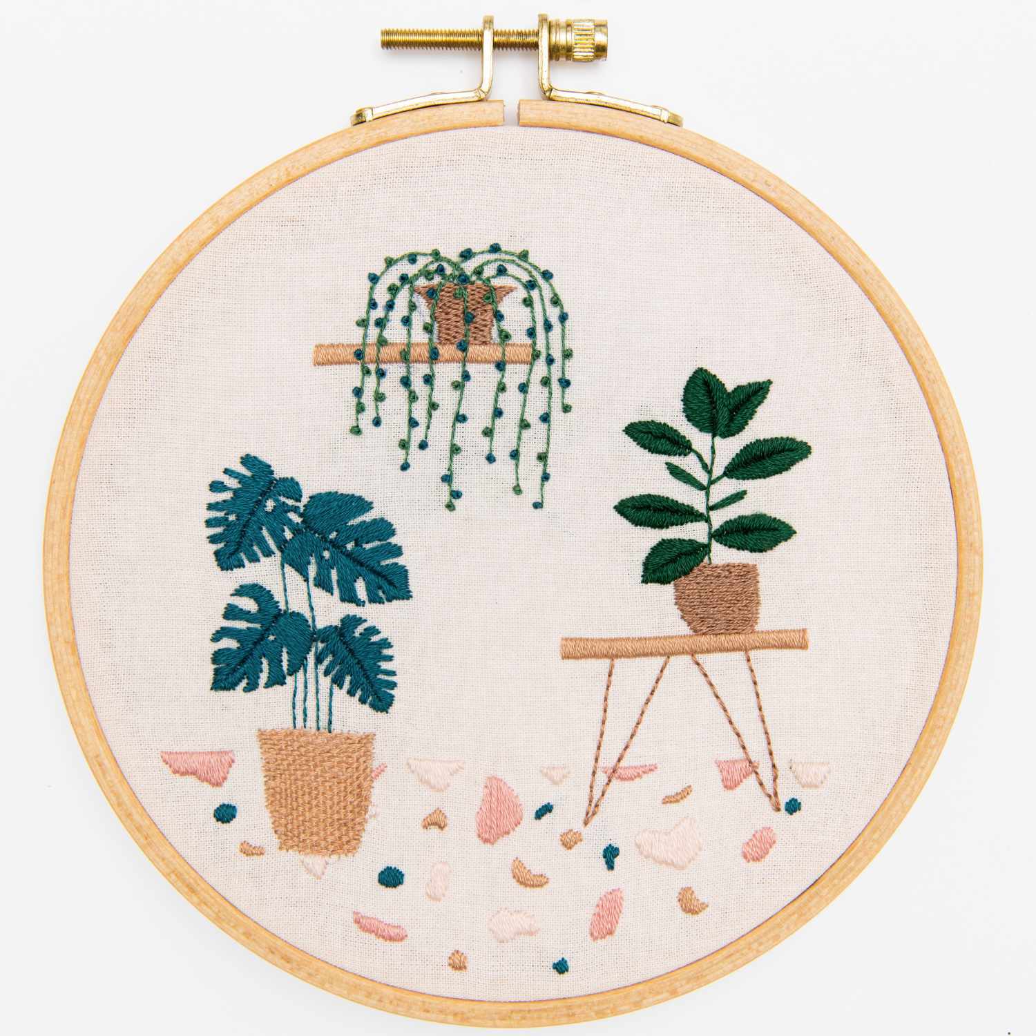 Stickpackung Slow Evenings Botanical zeigt drei Pflanzenmotive in einem Stickrahmen von Rico Design.