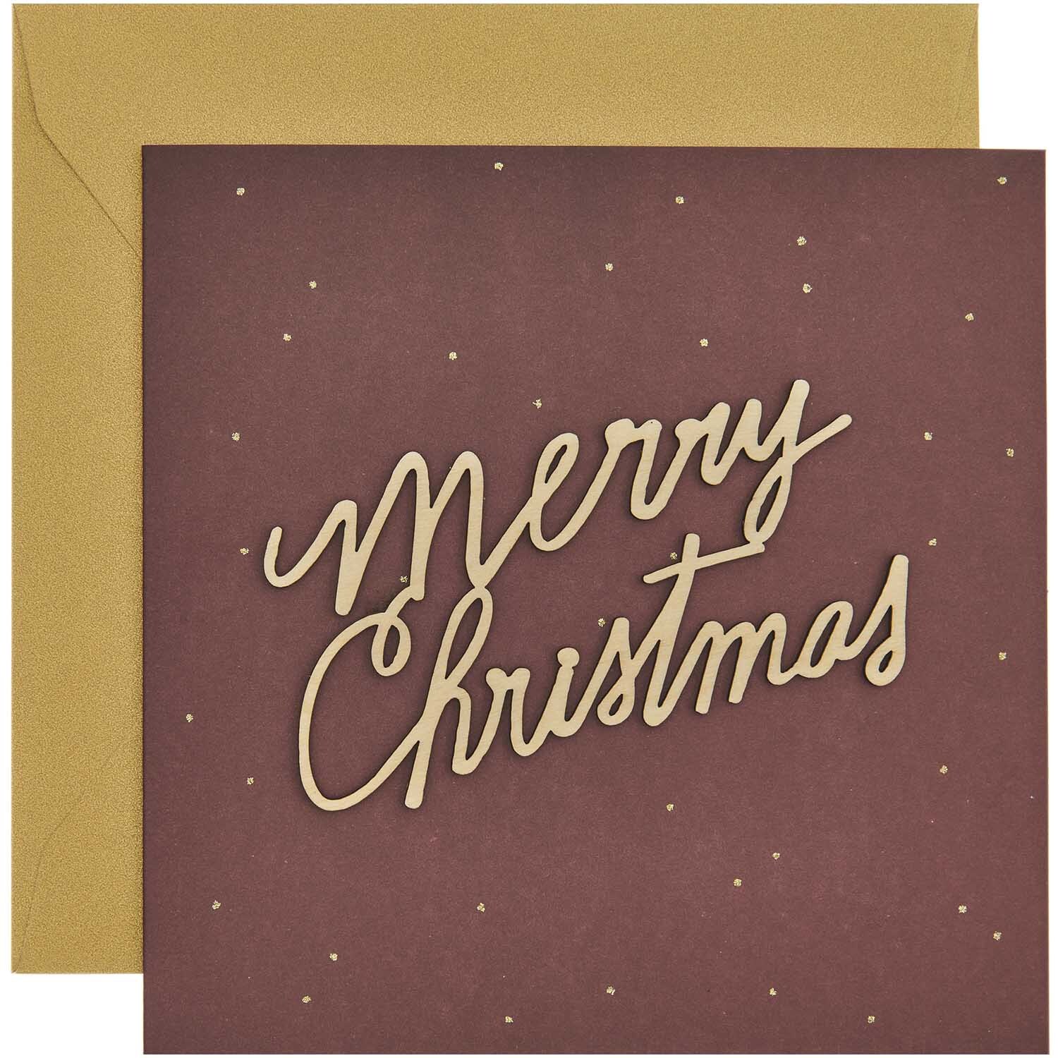 Paper Poetry Grußkarte mit "Merry Christmas" Schriftzug auf bordeauxfarbenem Hintergrund, von Rico Design.