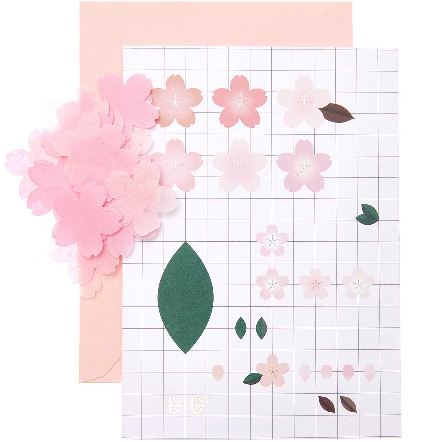 Paper Poetry Grußkartenset Kirschblüten grafisch zeigt rosa Blüten auf kariertem Hintergrund. Markenname: Rico Design.