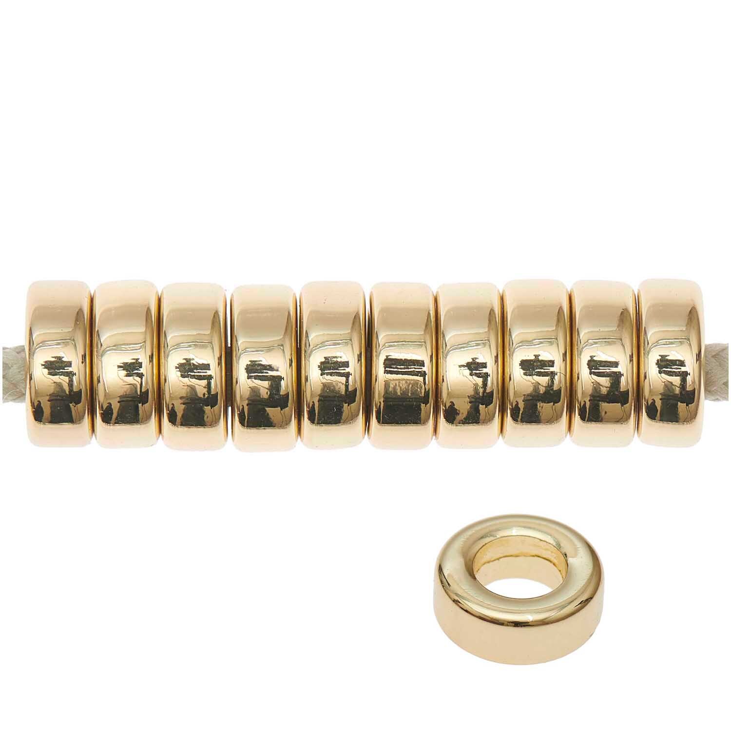 itoshii - Ponii Beads Ringe 9x3,5mm 10 Stück Farbe Gold von Rico Design Itoshii - Ponii Beads Ringe, 10 goldene Perlen von Rico Design, perfekt für Schmuckdesign.