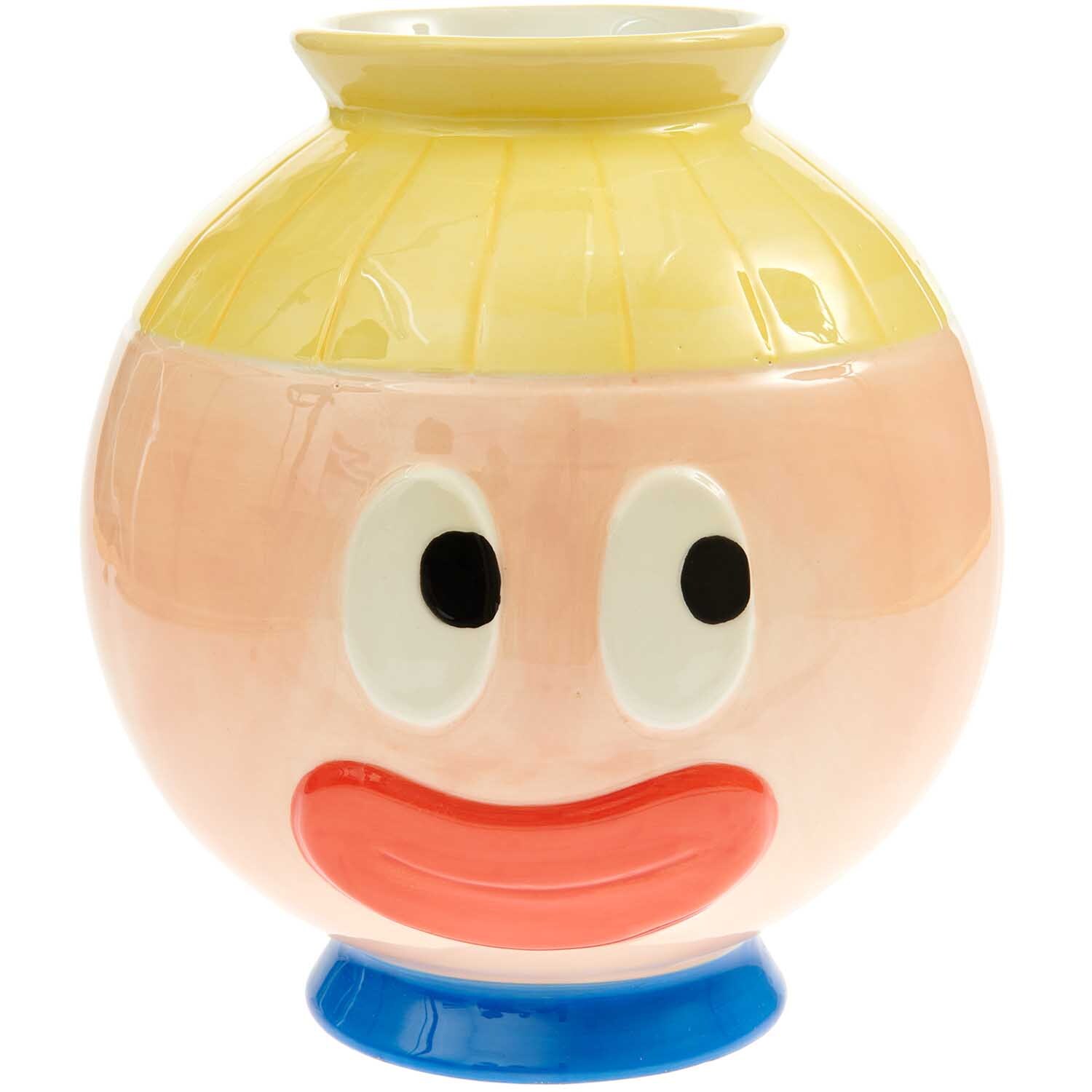 Rico Design x Redfries Keramik Vase Eye Candy mit buntem Gesichtsmotiv und gelbem Deckel.