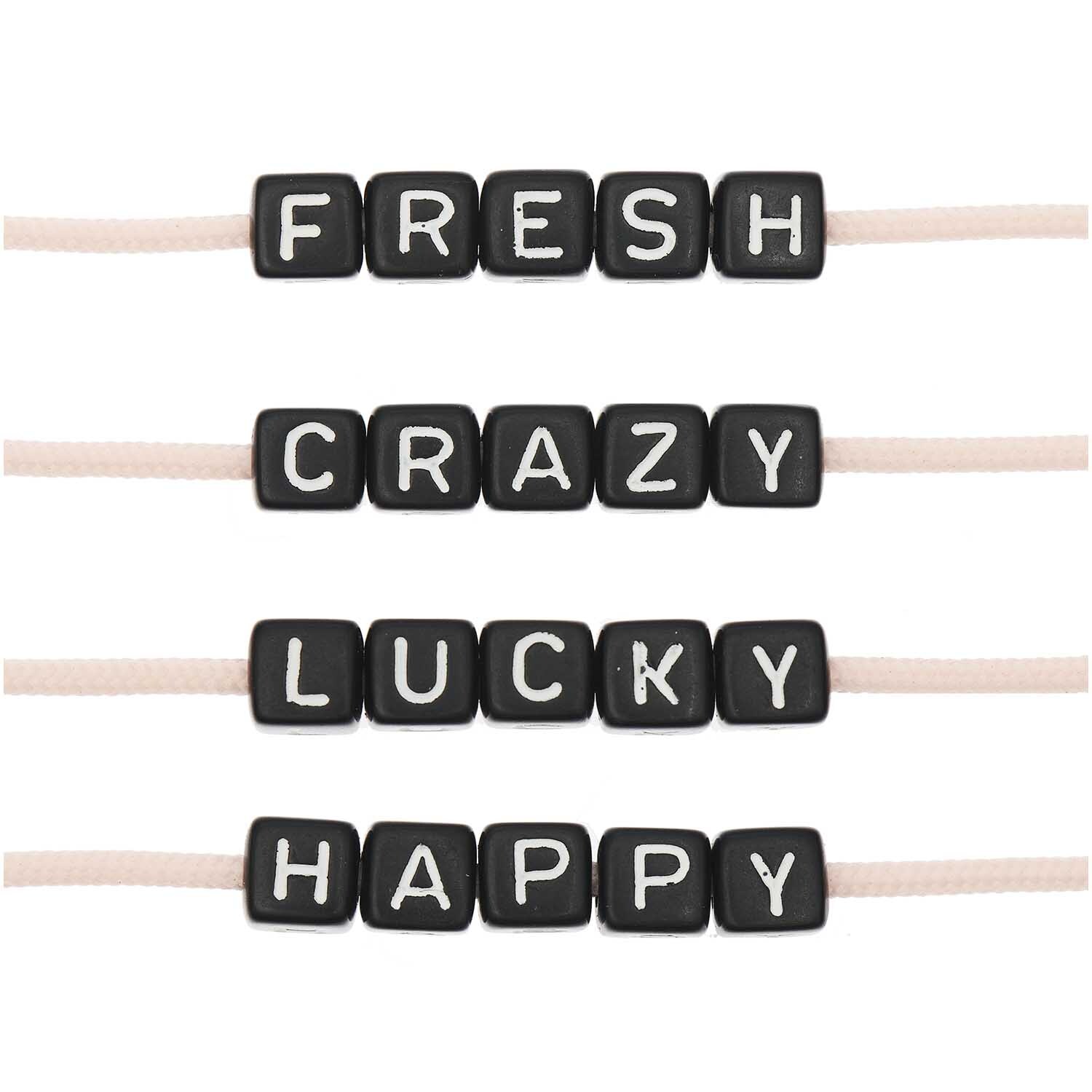 itoshii - Ponii Beads Würfelperlen Set 10x10x10mm 20 Stück Farbe Schwarz von Rico Design Ponii Beads Würfelperlen Set mit schwarzen Buchstabenwürfeln, die Wörter wie "FRESH" und "CRAZY" bilden. Ideal für kreative Designs.