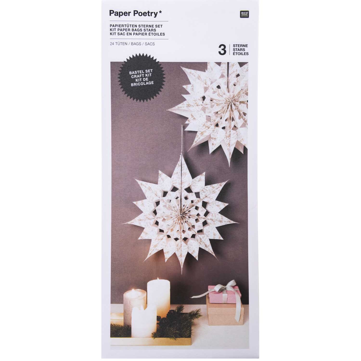 Paper Poetry Bastelset Papiertüten-Sterne Jolly Christmas groß zeigt weiße, dekorative Sterne, ideal für festliche Dekorationen.
