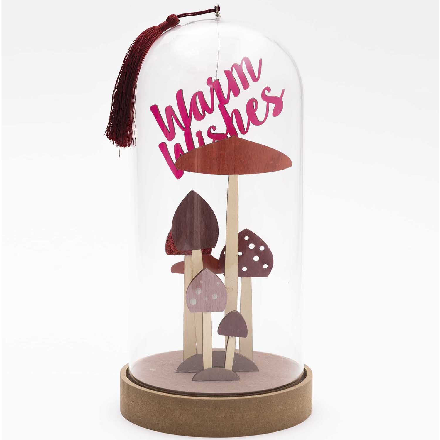 Holzdeko-Set Pilze für XL-Dekohaube 6-teilig von Rico Design Holzdeko-Set Pilze für XL-Dekohaube von Rico Design: Sechs Holzpilze unter Glas mit rotem Schriftzug "Warm Wishes".