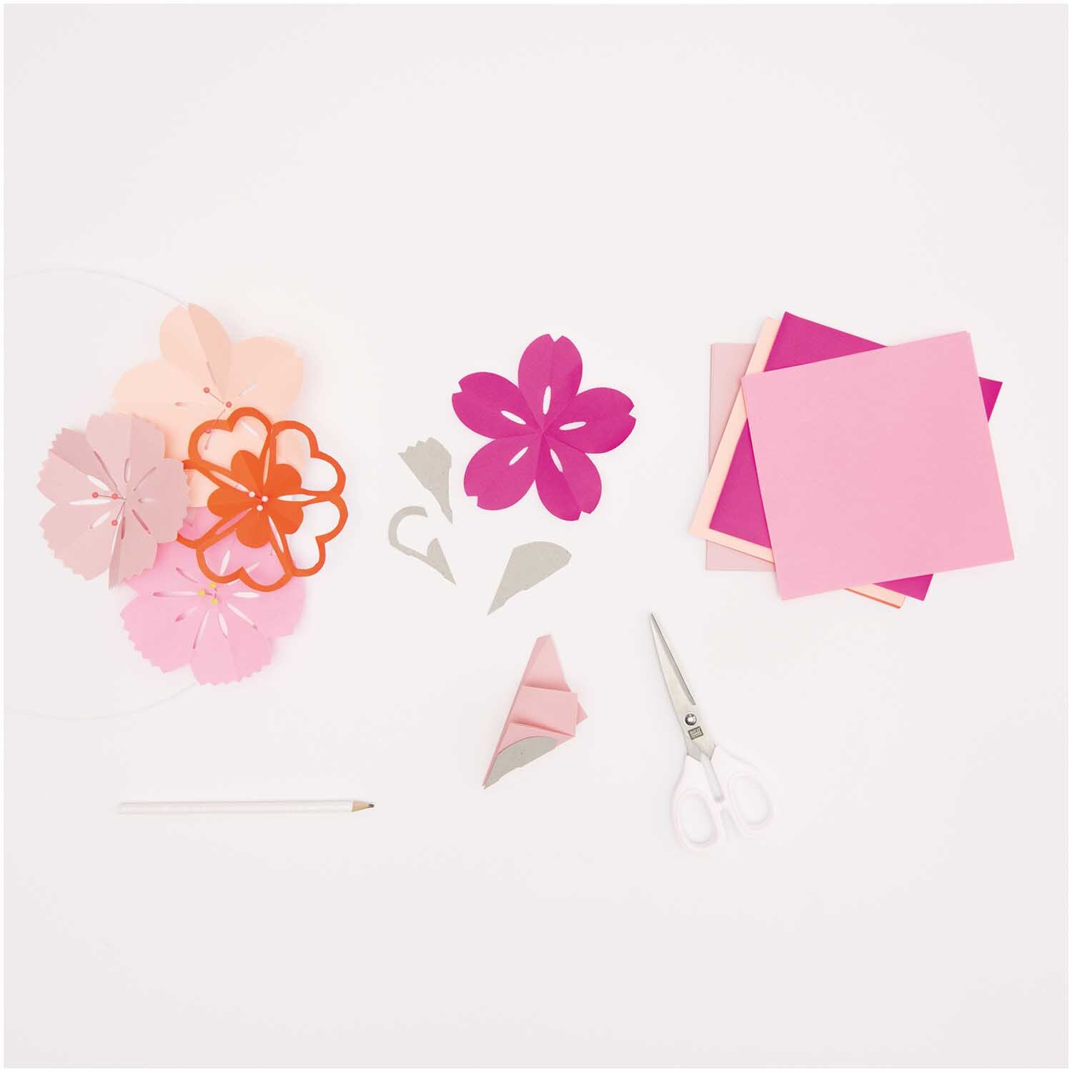 Paper Poetry Origami Blumen 15x15cm 50 Blatt 4 Schablonen von Rico Design Paper Poetry Origami Blumen-Set mit rosa und pinken Blättern, Schablonen und Schere.