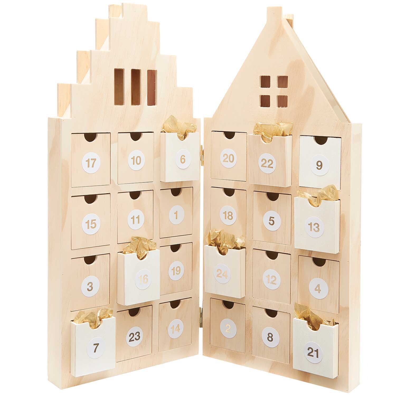 Adventskalender Haus aus Holz 46,5x51x5cm von Rico Design Adventskalender Haus aus Holz mit 24 nummerierten Schubladen, ideal für festliche Dekoration.
