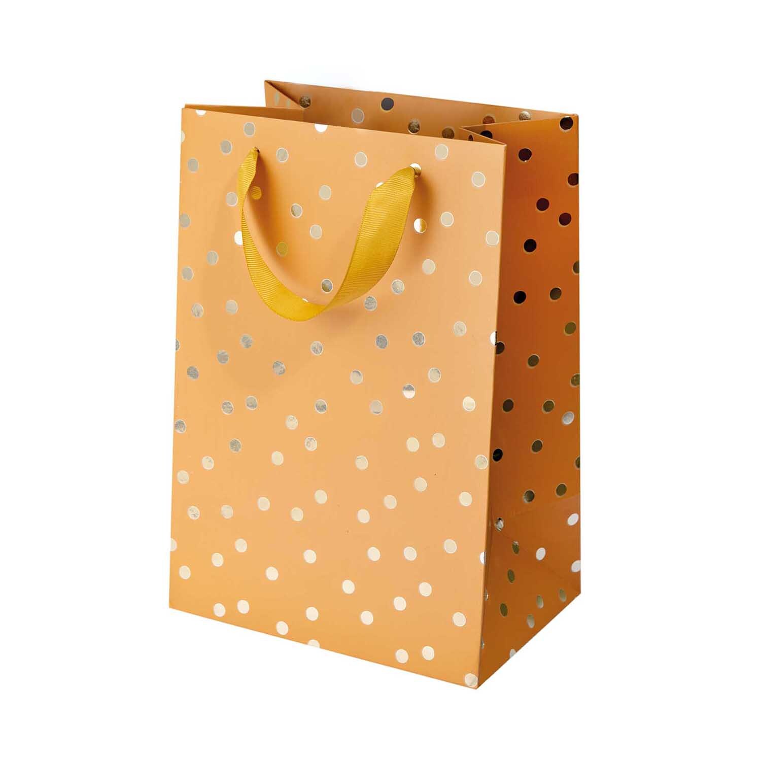 Paper Poetry Geschenktüte Punkte senf 18x26x12cm mit gelben Griffen und weißen Punkten. Ideal für stilvolle Geschenkverpackungen.