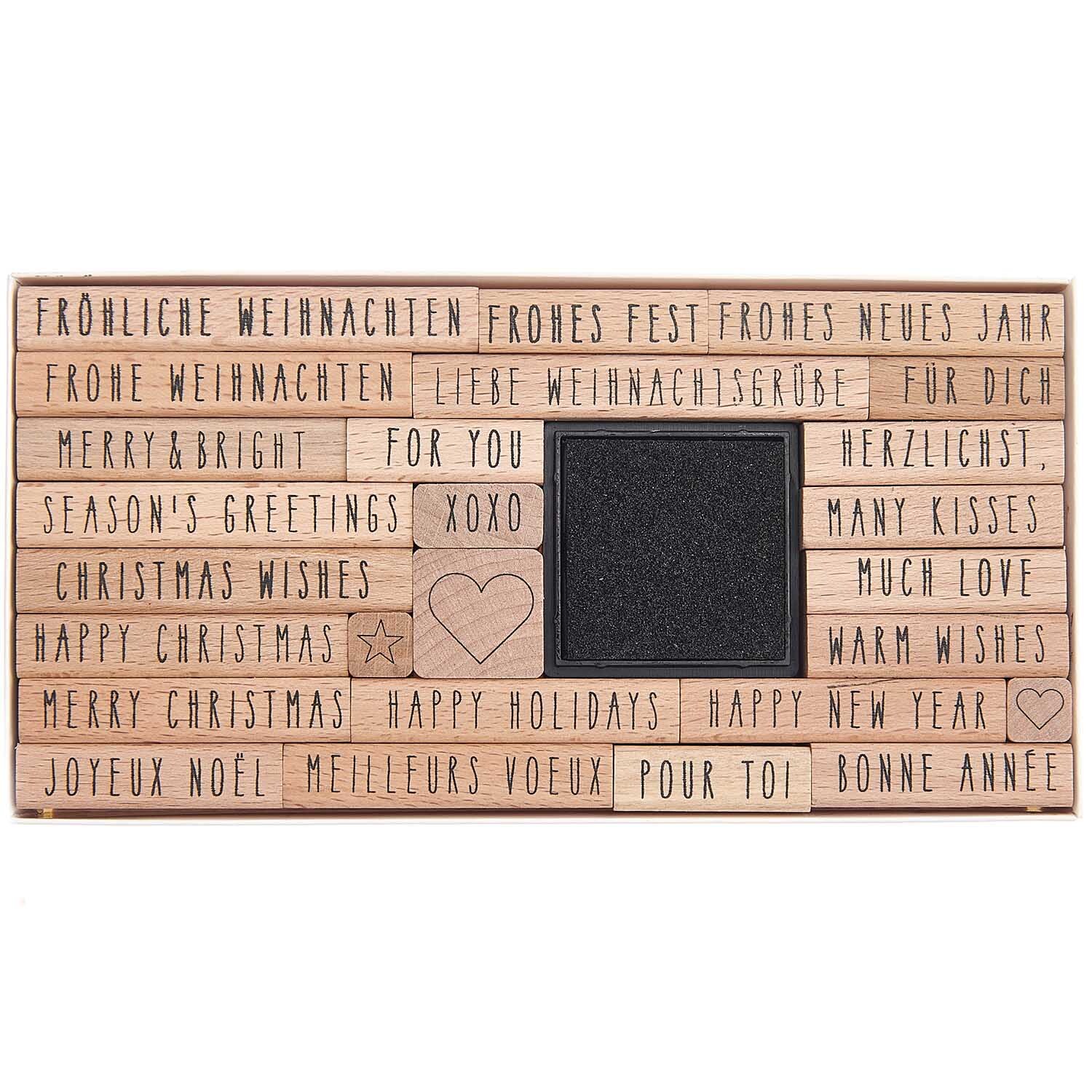 Paper Poetry XL Stempelset Merry Christmas Handwriting: 27-teiliges Set mit festlichen Holzstempeln und Herzmotiv von Rico Design.