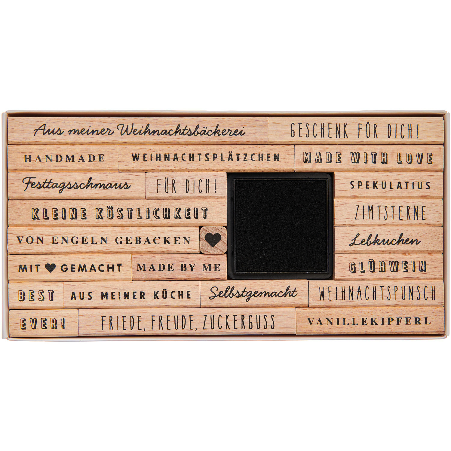 Paper Poetry Stempelset Weihnachtsbäckerei, 24-teilig, mit verschiedenen festlichen Motiven und Sprüchen, ideal für kreative Weihnachtsprojekte.