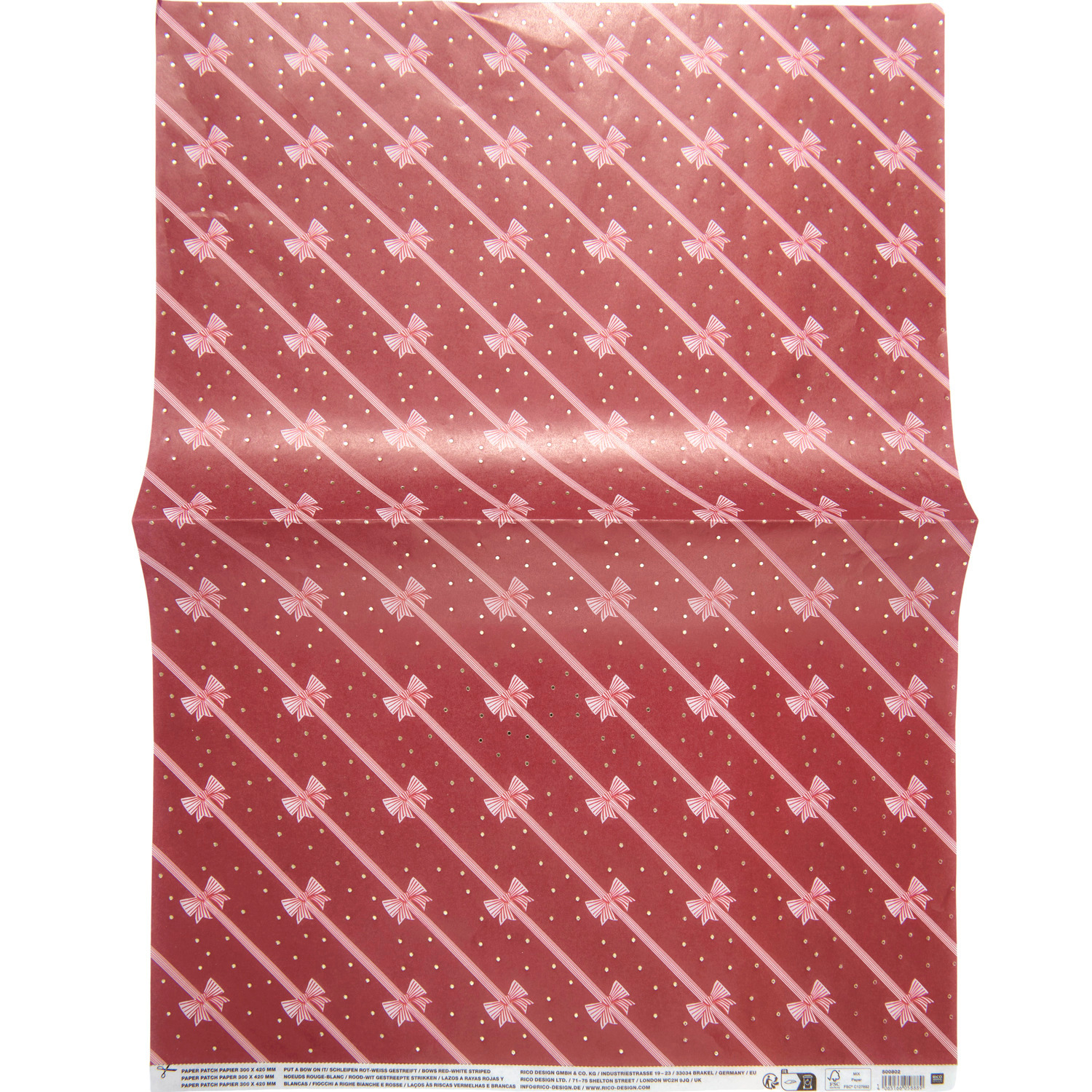 Paper Patch Schleifen Rot-weiß gestreift von Rico Design zeigt ein elegantes Schleifenmuster auf rotem Hintergrund. Ideal für kreative Projekte.