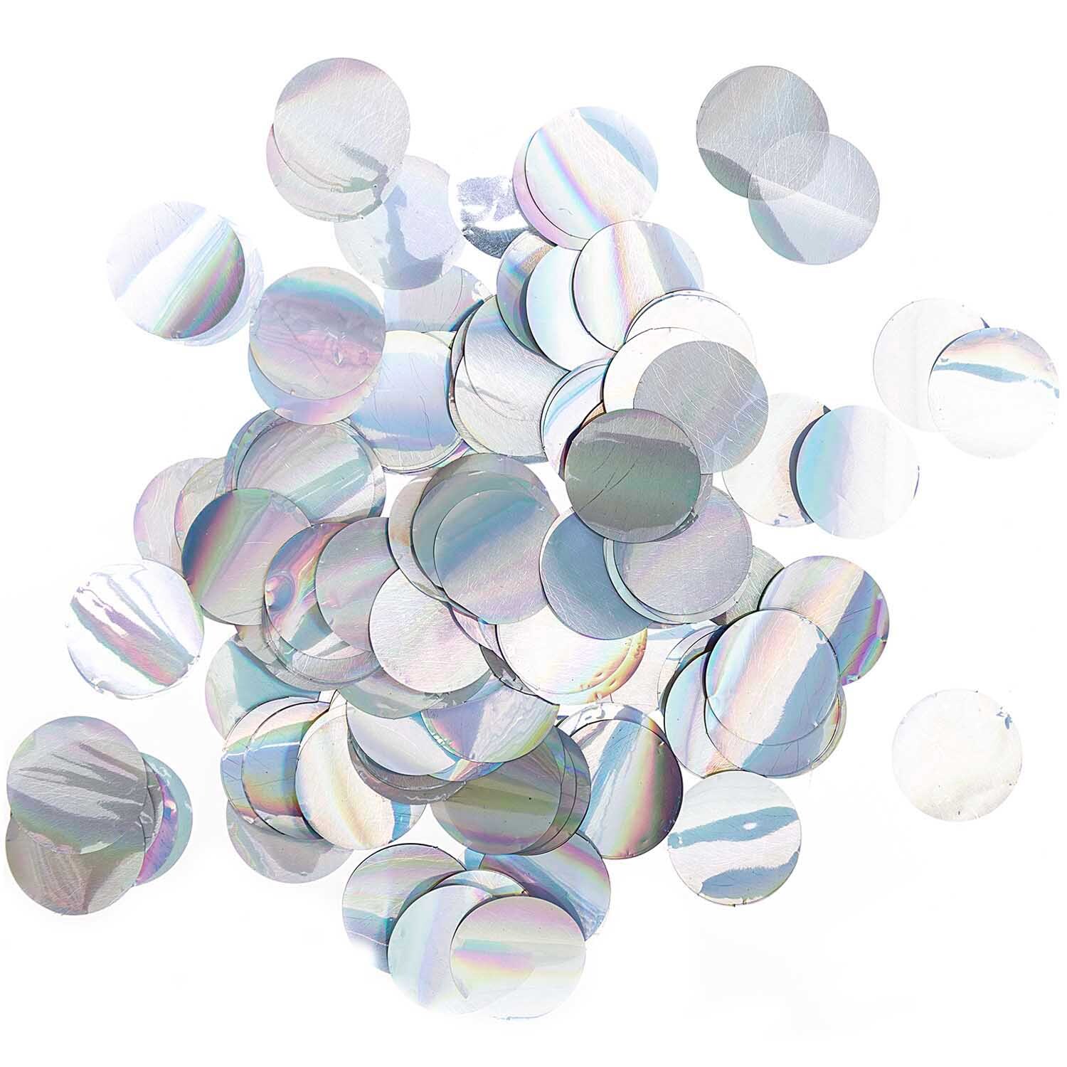 Flitter rund irisierend 25g von Rico Design, zeigt schimmernde, runde Pailletten in irisierenden Farben. Ideal für kreative Bastelprojekte.