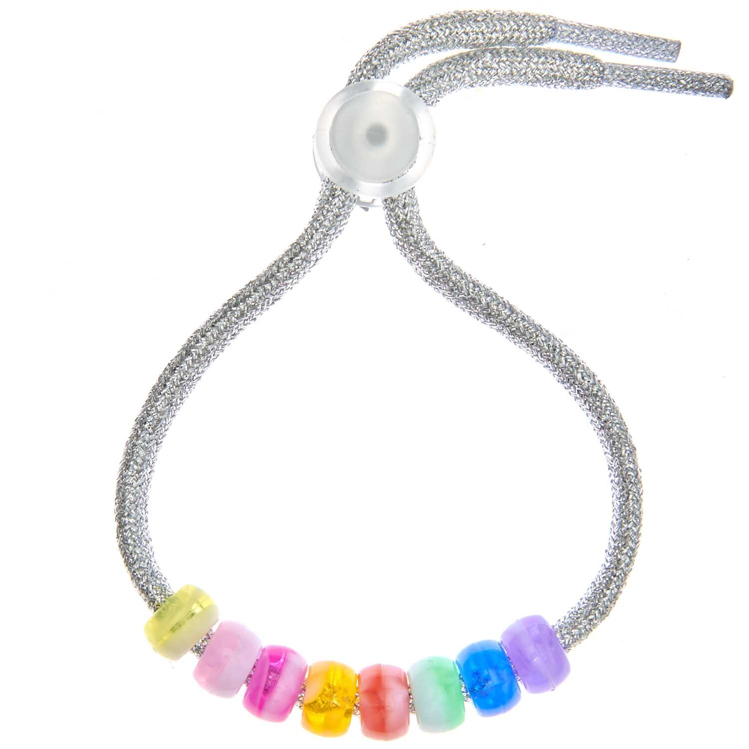itoshii - Ponii Beads Marmor Regenbogen 9x6mm 400 Stück von Rico Design Itoshii - Ponii Beads Marmor Regenbogen 9x6mm, 400 Stück. Bunte Perlen auf silbernem Band. Ideal für kreative Designs.