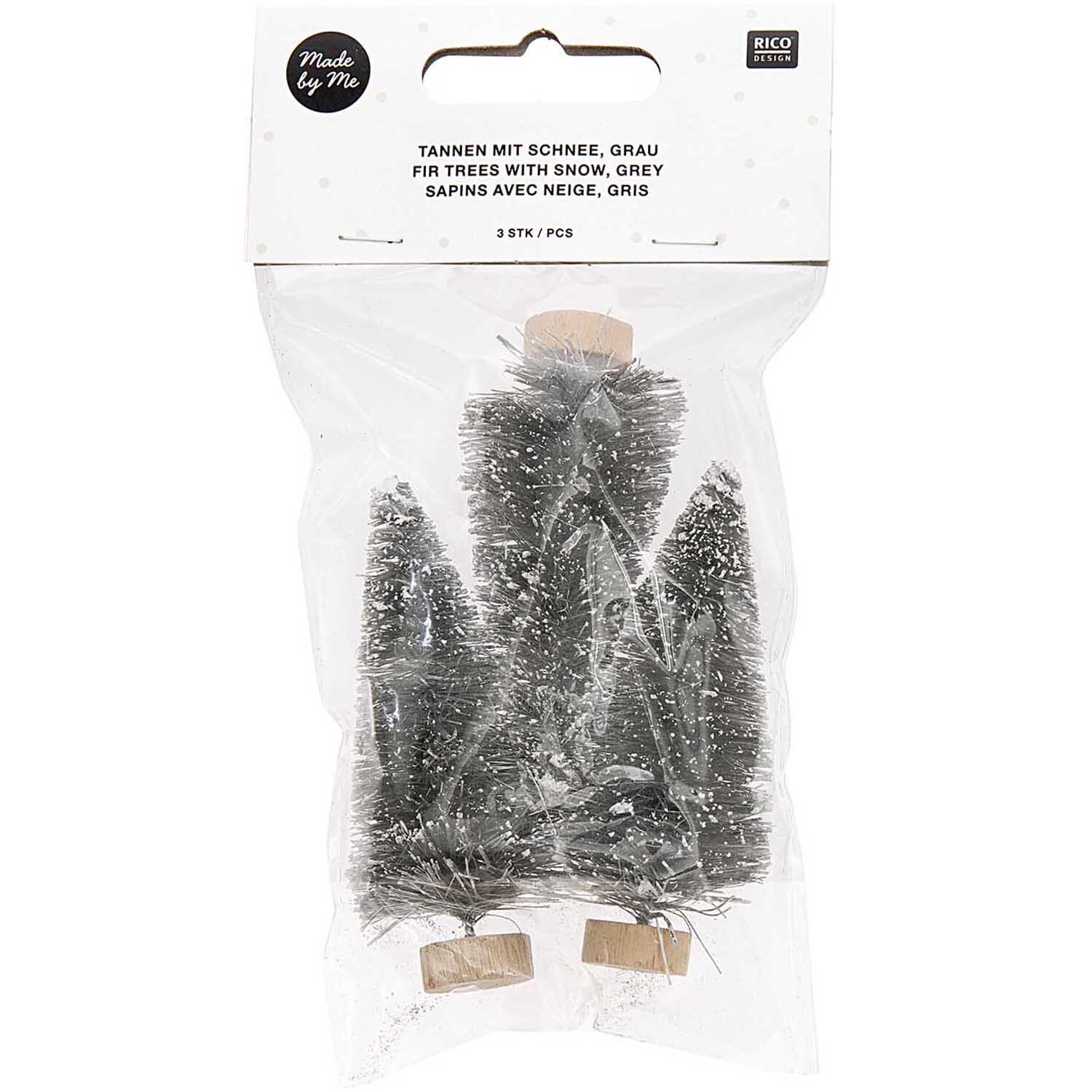 Tannen mit Schnee 7cm 3 Stück: Drei graue Miniatur-Tannenbäume mit Schnee von Rico Design in Verpackung.