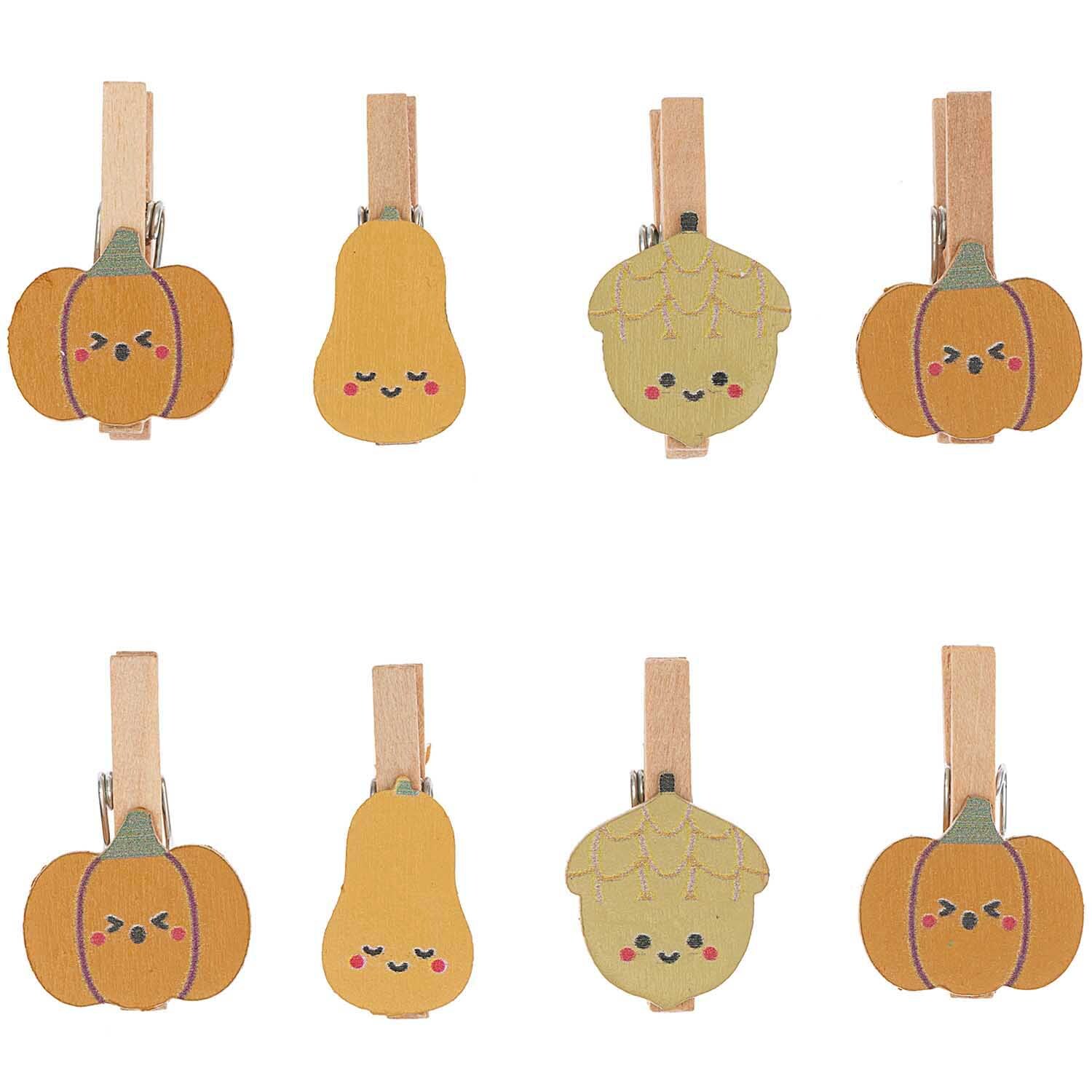 Holzclips Kürbis Mix bunt 3cm 8 Stück: Niedliche Holzklammern in Kürbisform von Rico Design, ideal für herbstliche Dekorationen.