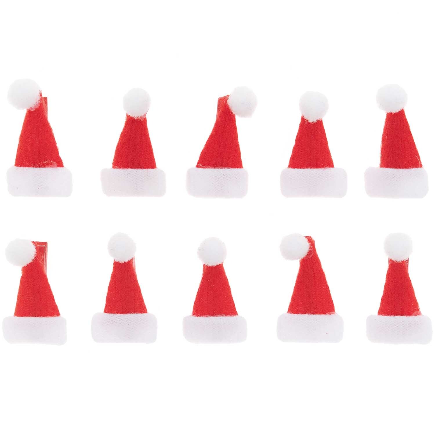Dekoklammern Weihnachtsmützen 2,5cm 10 Stück von Rico Design: Zehn rote Mini-Weihnachtsmützen als Dekoklammern.