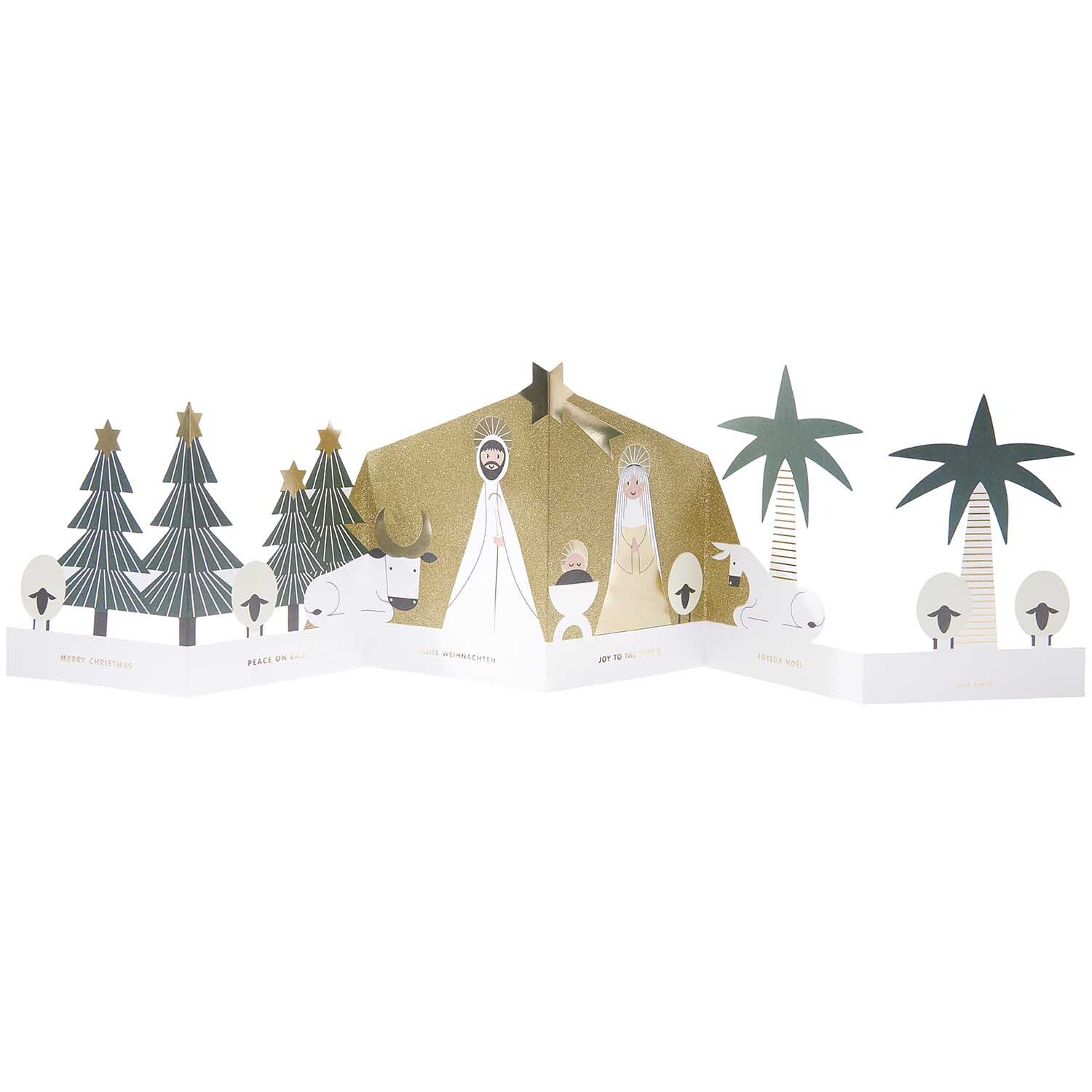 Paper Poetry Zickzack-Karte Holy Family zeigt eine weihnachtliche Szene mit Tannenbäumen und Palmen.