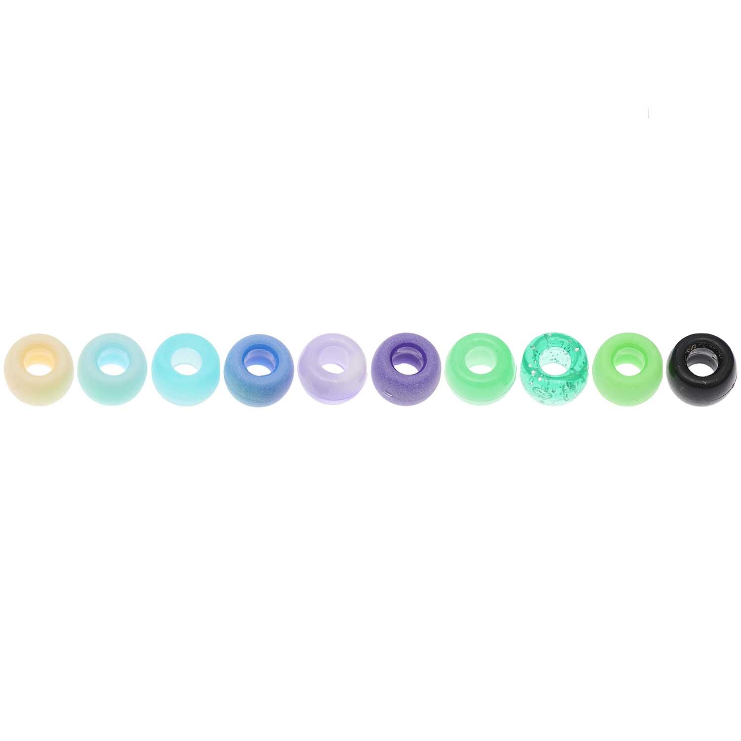 itoshii - Ponii Beads Aqua Mix 9x6mm 80 Stück, bunte Perlenreihe von Rico Design in verschiedenen Blau- und Grüntönen auf weißem Hintergrund.