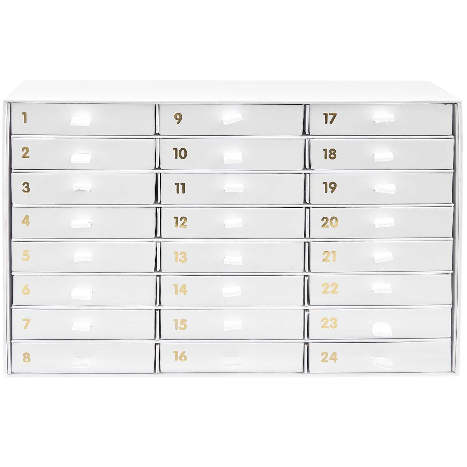 Adventskalender Box mit 24 nummerierten Schubladen in Weiß und Gold, ideal für kreative Geschenke.