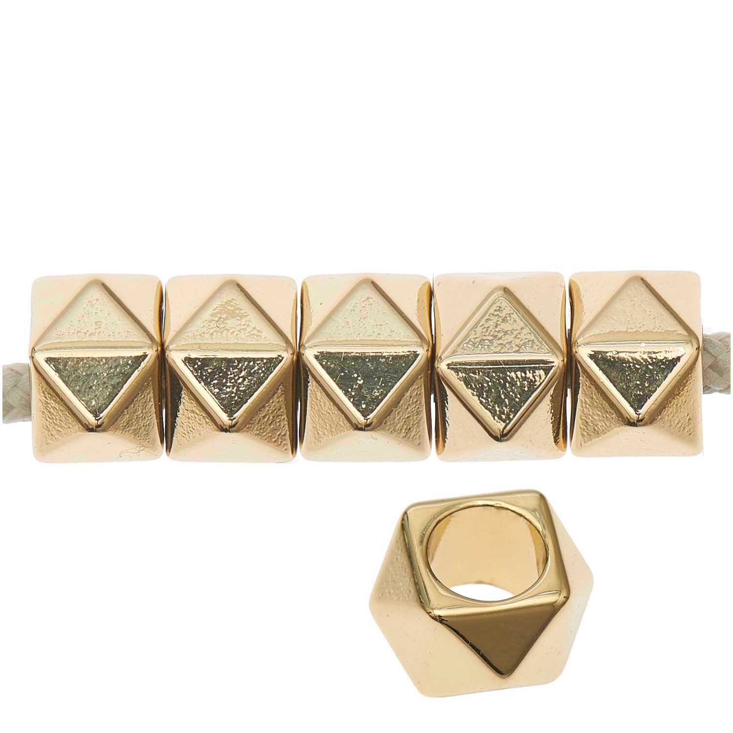 itoshii - Ponii Beads Polygone 11x7mm 10 Stück Farbe Gold von Rico Design itoshii - Ponii Beads Polygone 11x7mm, 10 Stück, goldene Perlen mit geometrischem Design von Rico Design. Ideal für Schmuckherstellung.