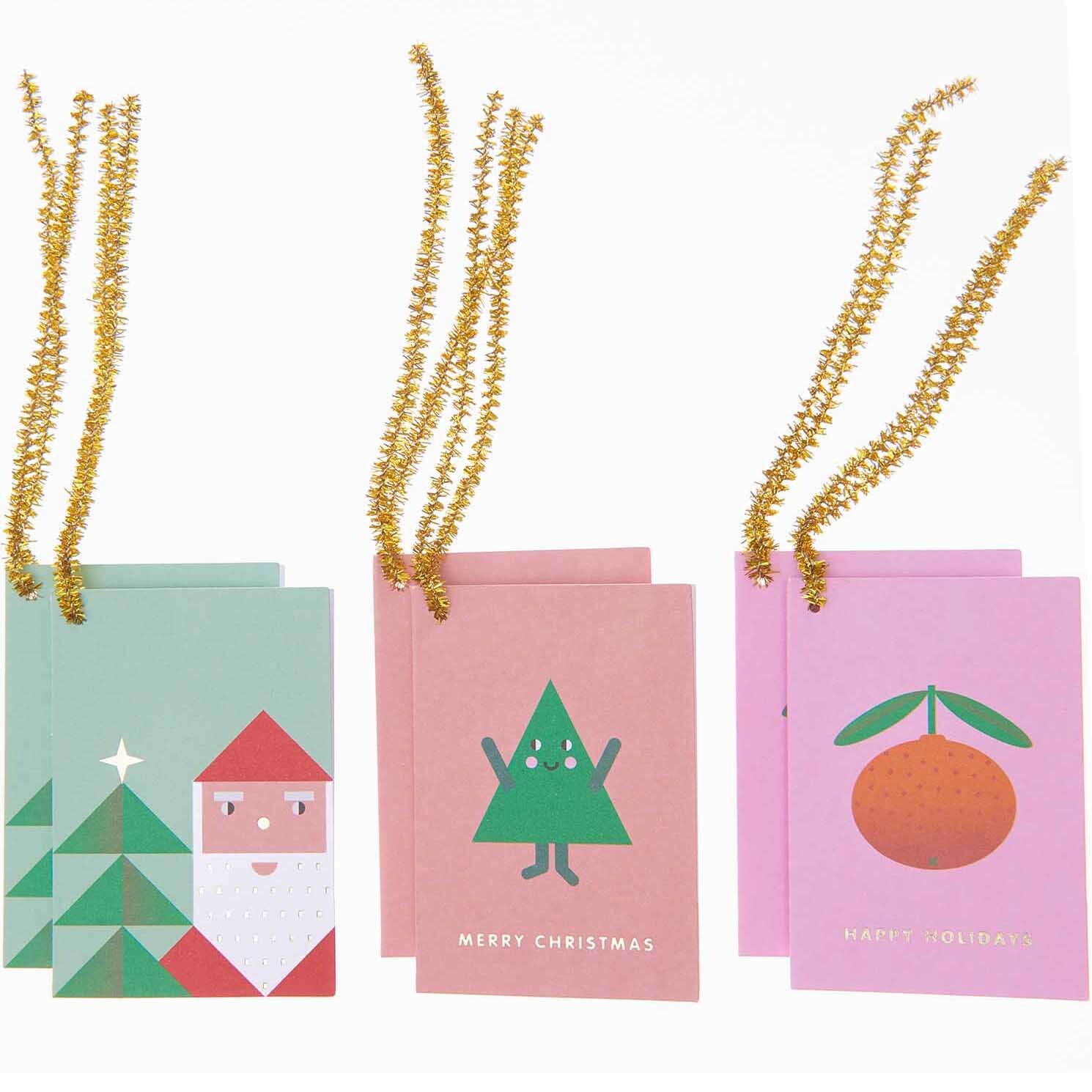 Paper Poetry Kärtchenanhänger pastell Merry Christmas 6 Stück mit festlichen Motiven und goldenen Bändern von Rico Design.