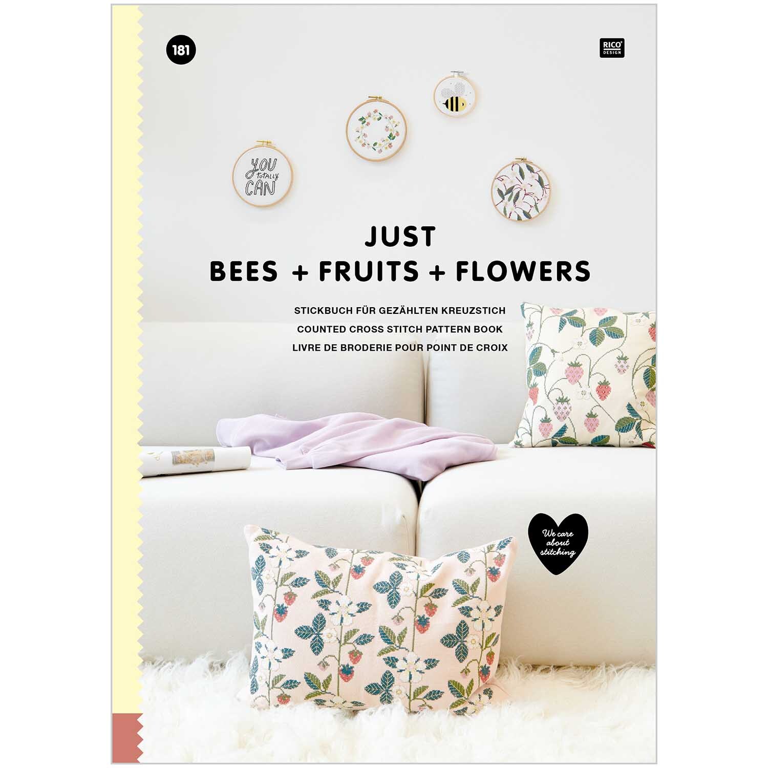 Stickbuch Just Bees + Fruits + Flowers Nr. 181 zeigt ein stilvolles Wohnzimmer mit bestickten Kissen und Wanddekorationen.